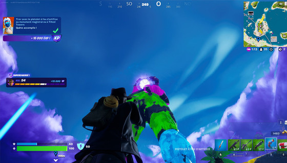 Défi : Tirer avec le pistolet à feu d'artifice au monument magistral ou à Tilted Towers